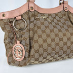 Gucci Sukey in tela GG e pelle rosa