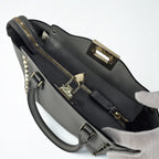 Valentino Garavani Rockstud Small Bag in pelle grigia